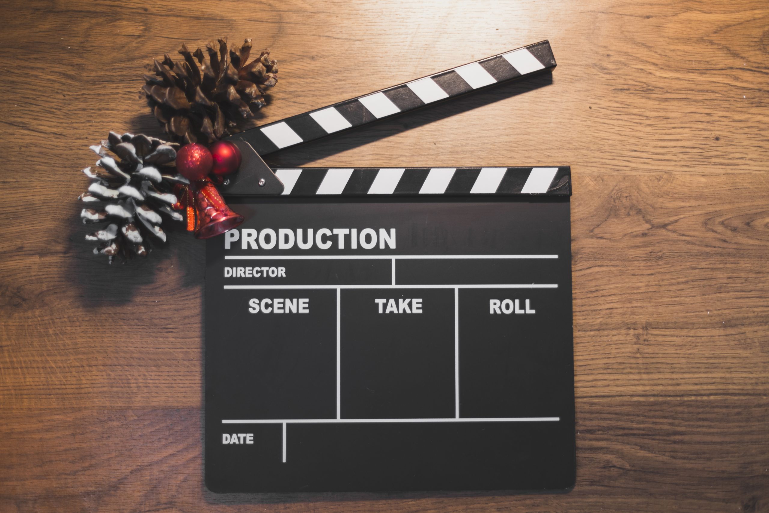 clapperboard with christmas decoration scaled